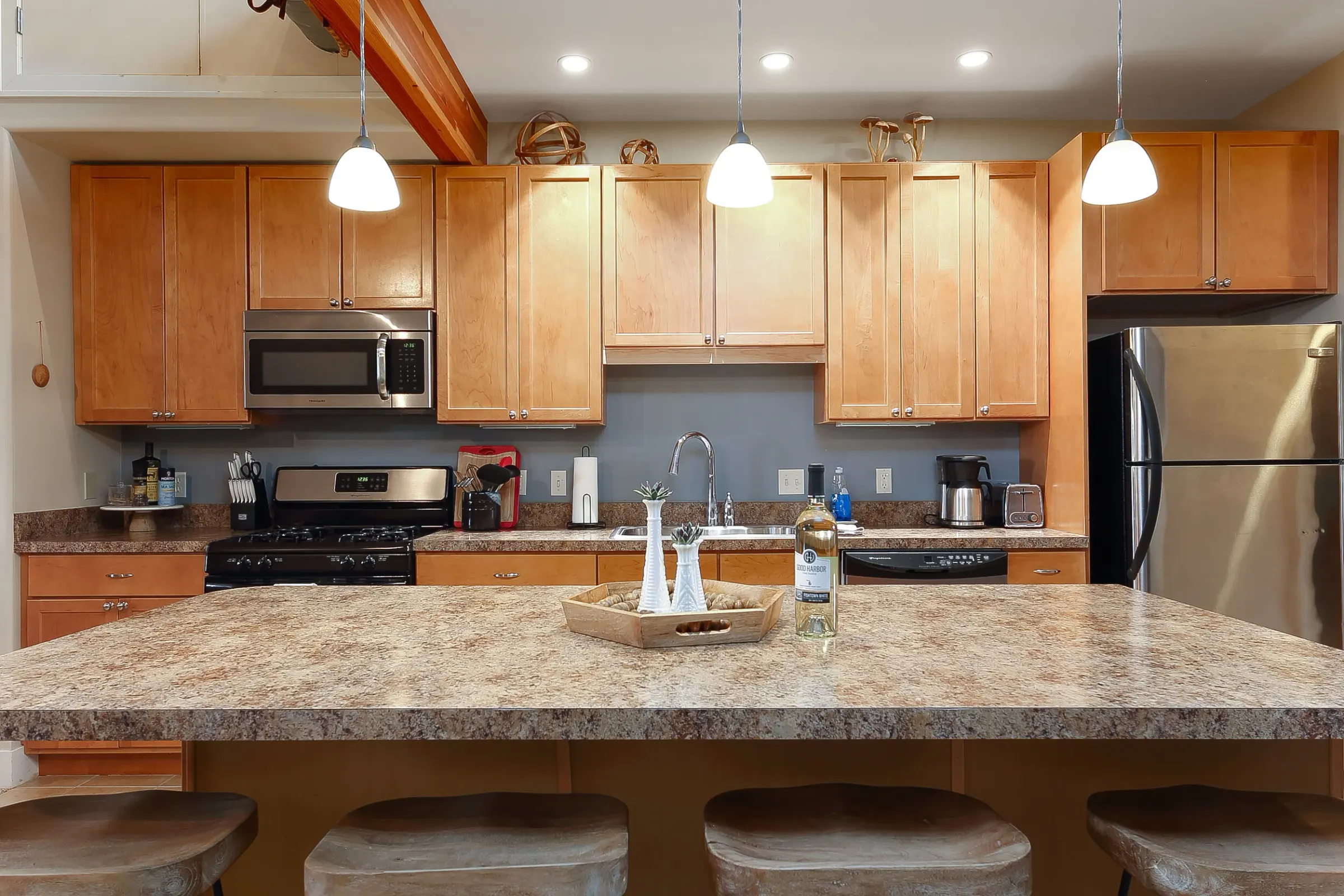 Sunlit open-concept layout of this premium vacation rental in The Commons, Traverse City